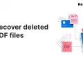 Recuperare file cancellati: un cestino blu pieno di documenti PDF rosa e blu, con alcuni fogli che escono.