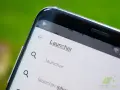 Schermata di un telefono con la parola "Launcher" in evidenza, suggerendo la ricerca di un nuovo launcher di sistema.