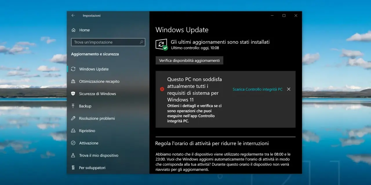 Schermata di Windows Update che mostra "Questo PC non soddisfa attualmente tutti i requisiti di sistema per Windows 11", impedendo di installare Windows 11 senza requisiti.