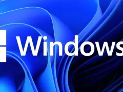 Logo di Windows 11 su sfondo blu astratto. Un aggiornamento che porta un nuovo look al tuo PC.