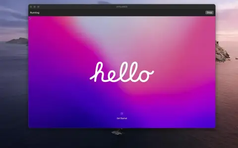 Schermata di avvio di una macchina virtuale con sfondo sfumato rosa-viola e la scritta "hello".