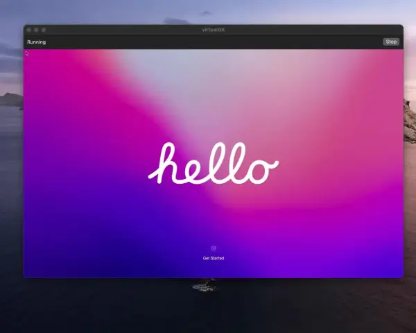 Schermata di avvio di una macchina virtuale con sfondo sfumato rosa-viola e la scritta "hello".