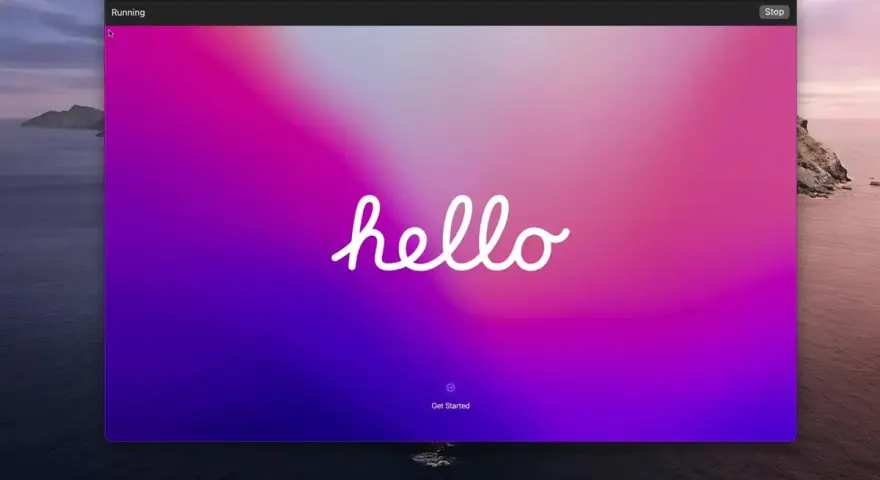 Schermata di avvio di una macchina virtuale con sfondo sfumato rosa-viola e la scritta "hello".