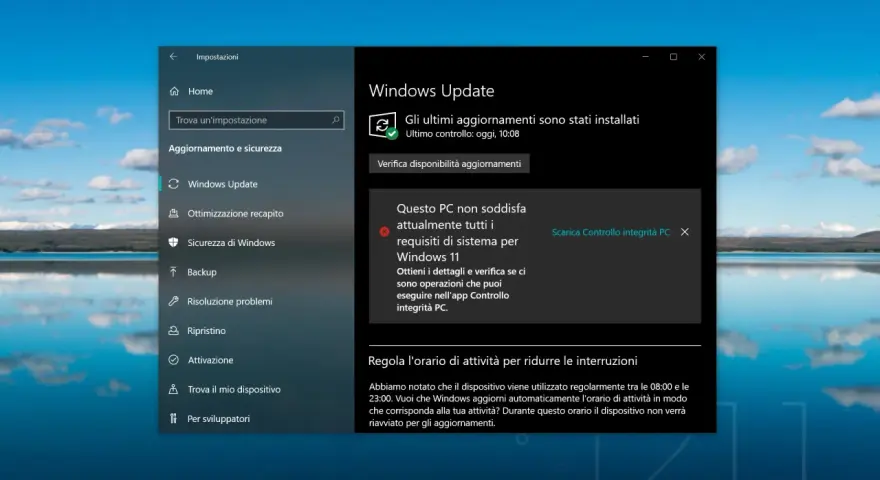 Schermata di Windows Update che mostra "Questo PC non soddisfa attualmente tutti i requisiti di sistema per Windows 11", impedendo di installare Windows 11 senza requisiti.